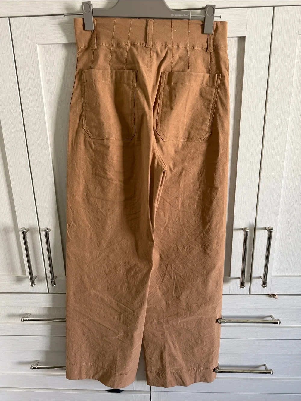 Maeve Colette in Tan